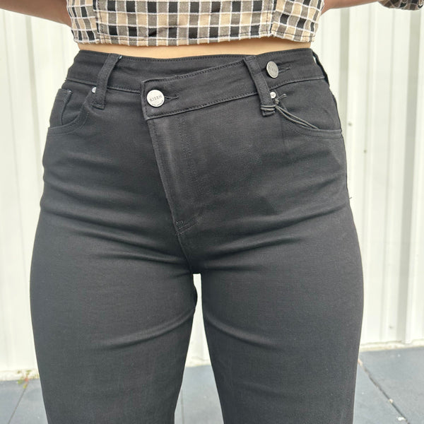 Black high-rise crossover jeans