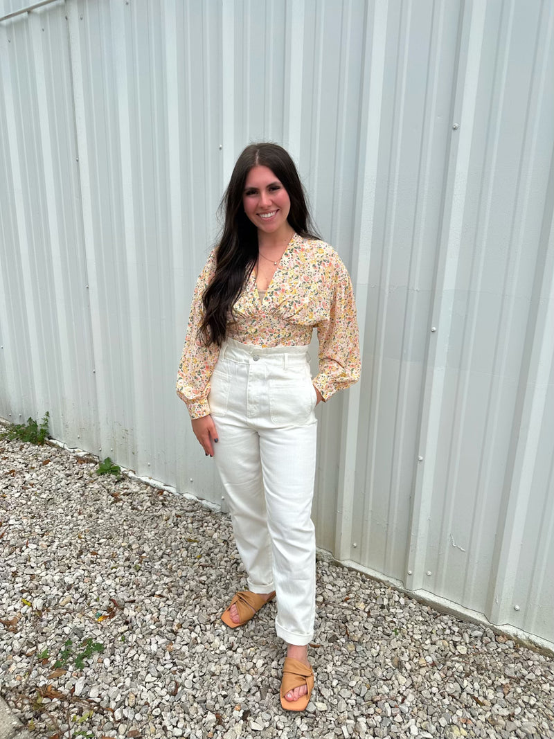 White ruffle jeans